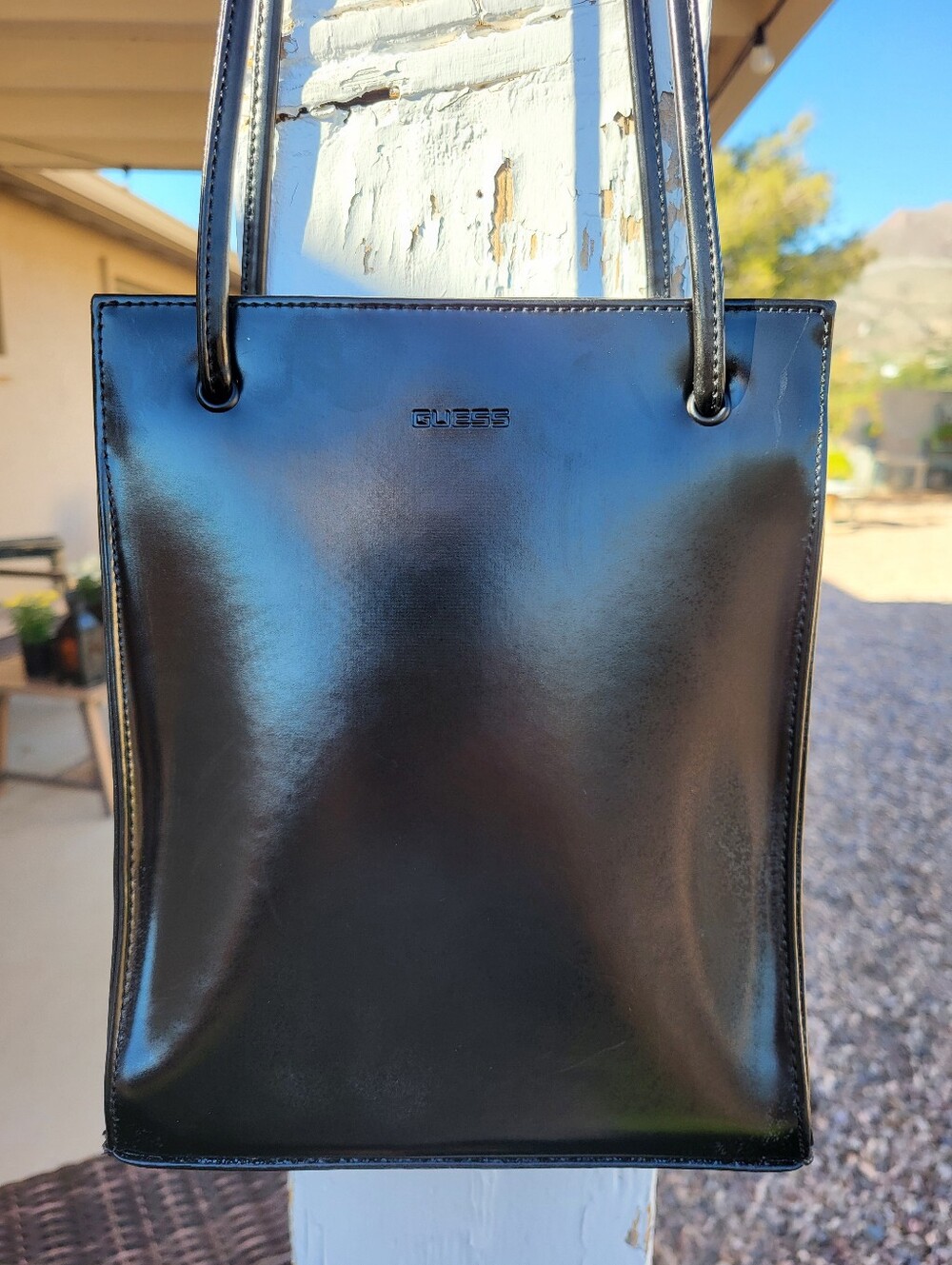 Guess Vintage Y2K Era Black Sleek Faux Leather Shoulder Bag With Silver Feet.